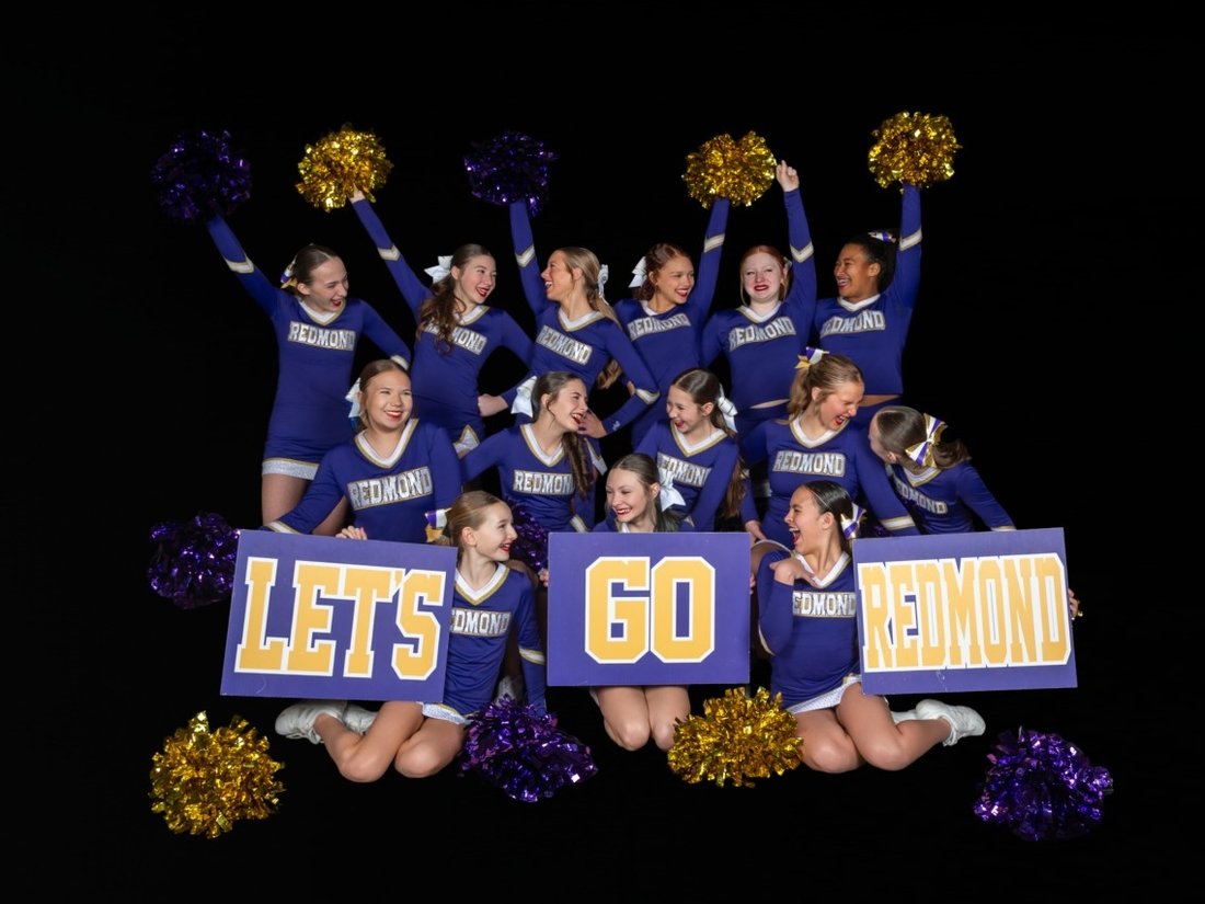 Mountain Peak Athletics Juniors team with Let's Go Redmond signs